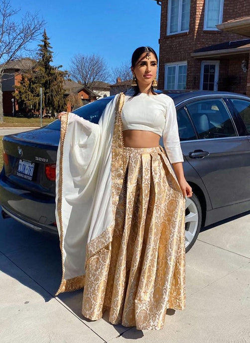 Graceful Look Beige color Silk Base Lehenga With White Color Blouse